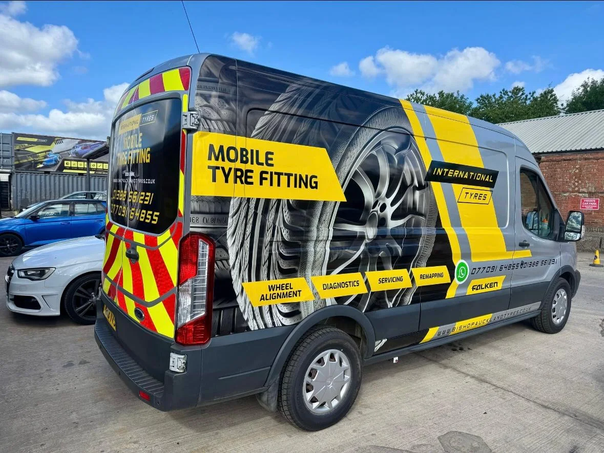 International Tyres’ black and yellow van at its premises